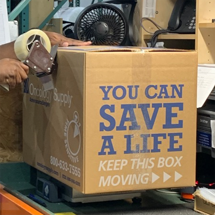 Sealing a box at our distribution center